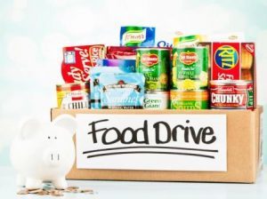 image of box of food drive food and a piggy bank