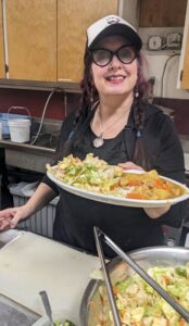 photo of Tracey Bartel Volunteering at Eagles scholarship dinner fundraiser for Liberty Bell High School Seniors