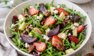 photo of arugula salad with strawberries and chevre