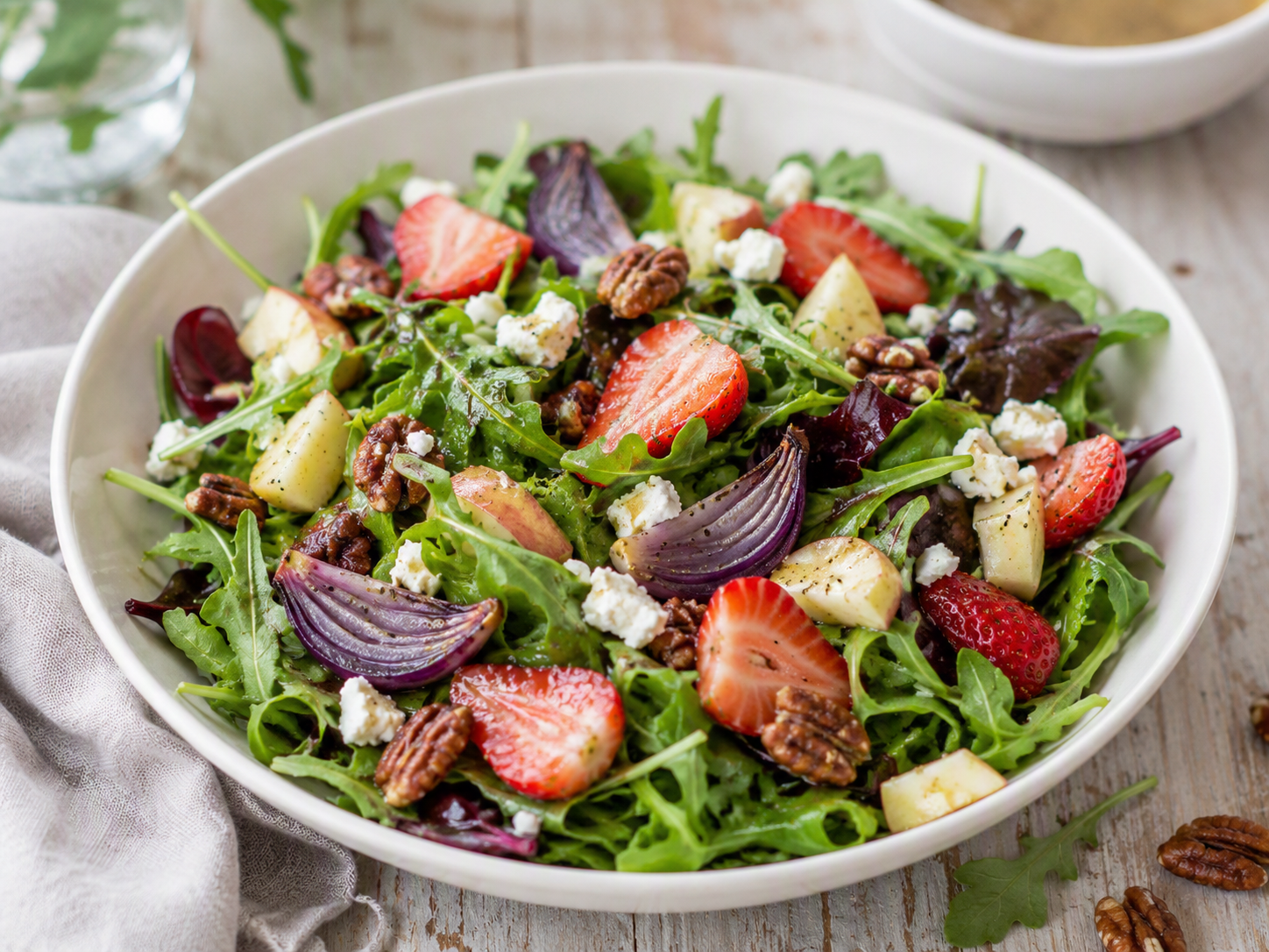 photo of arugula salad with strawberries and chevre